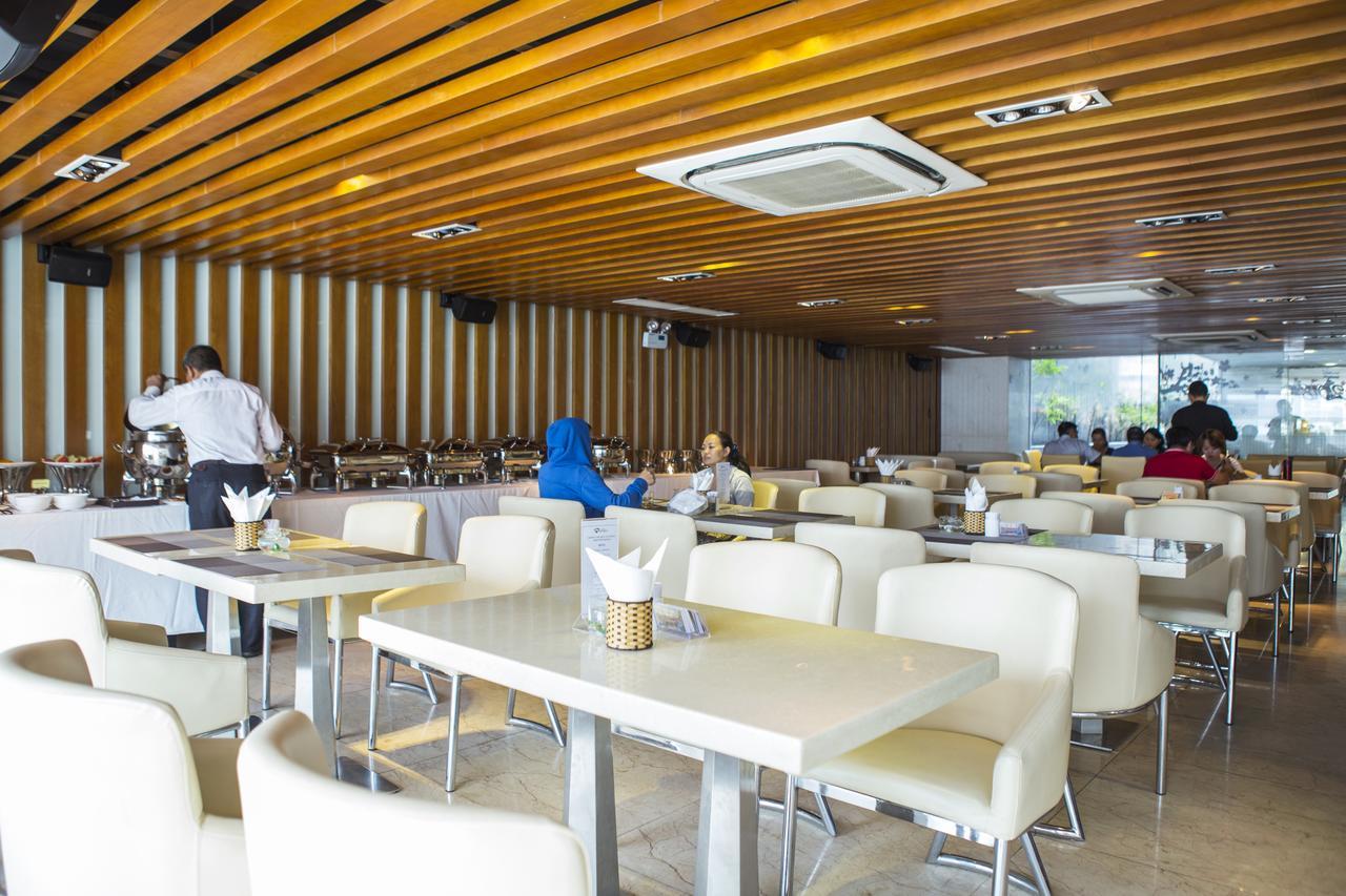 Triip Mismo Airport Hotel Thành Pho Ho Chí Minh Esterno foto
